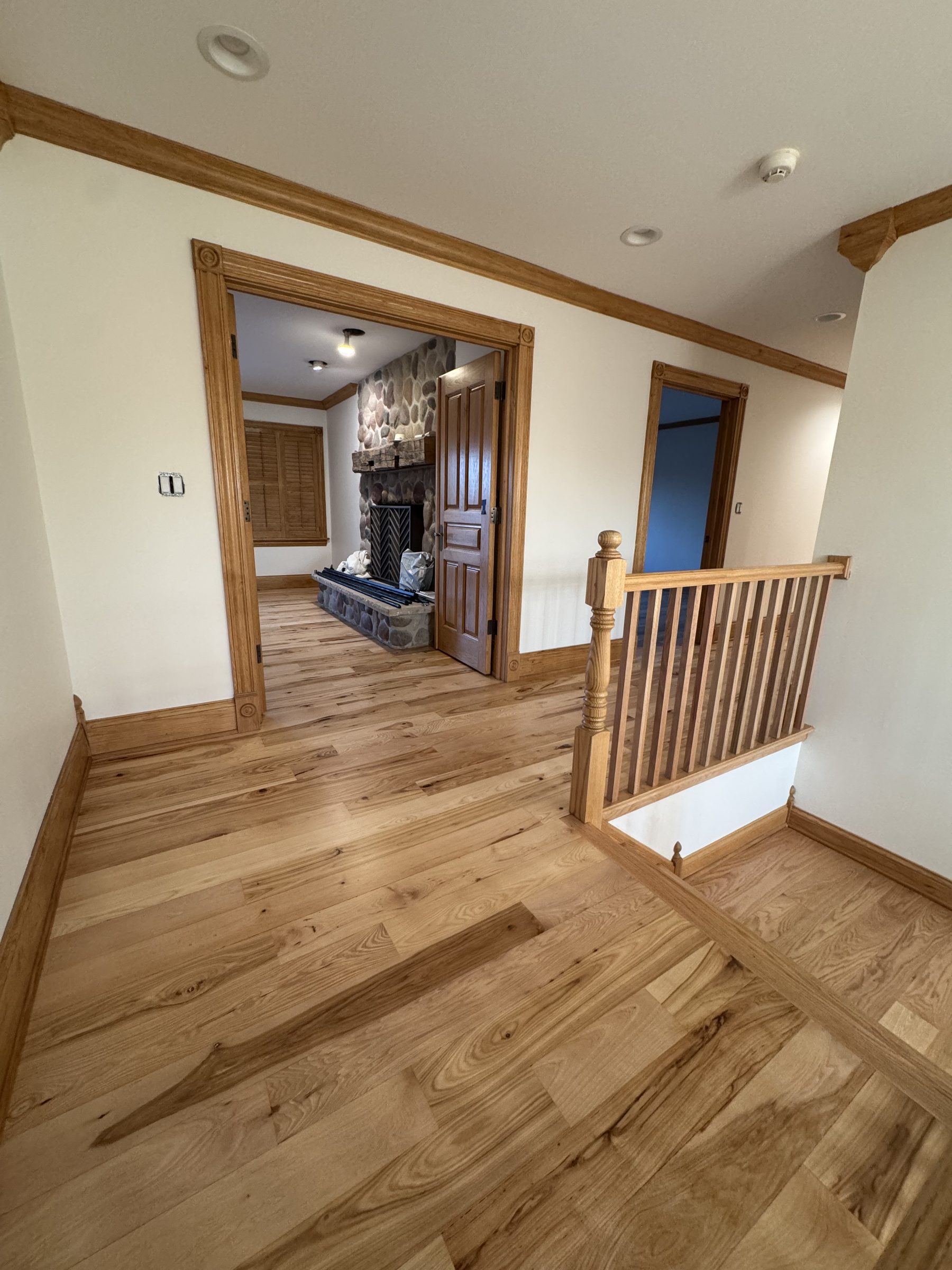 Hickory hardwood upper hallway and railing